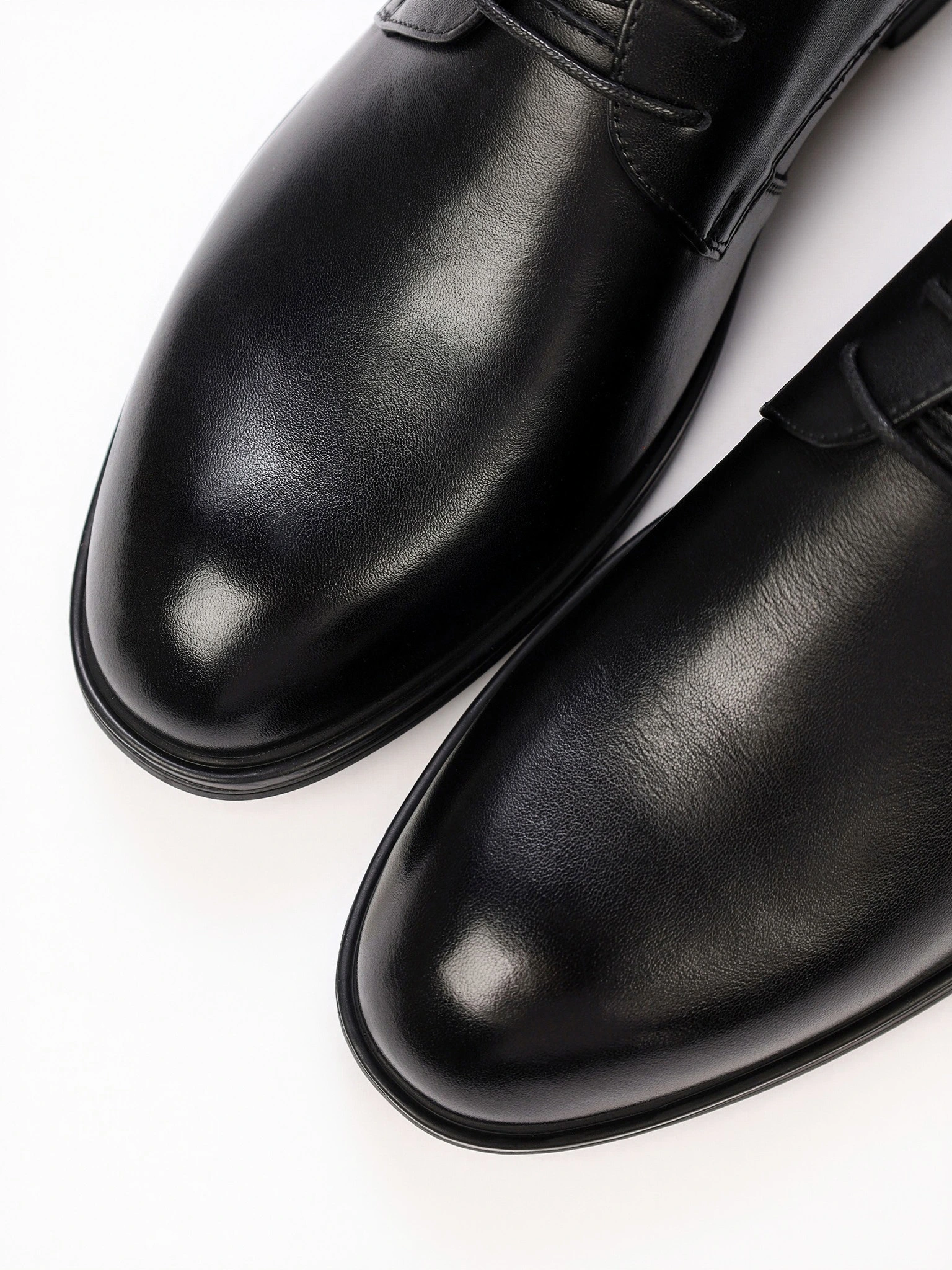 Туфли-дерби черного цвета на низком каблуке